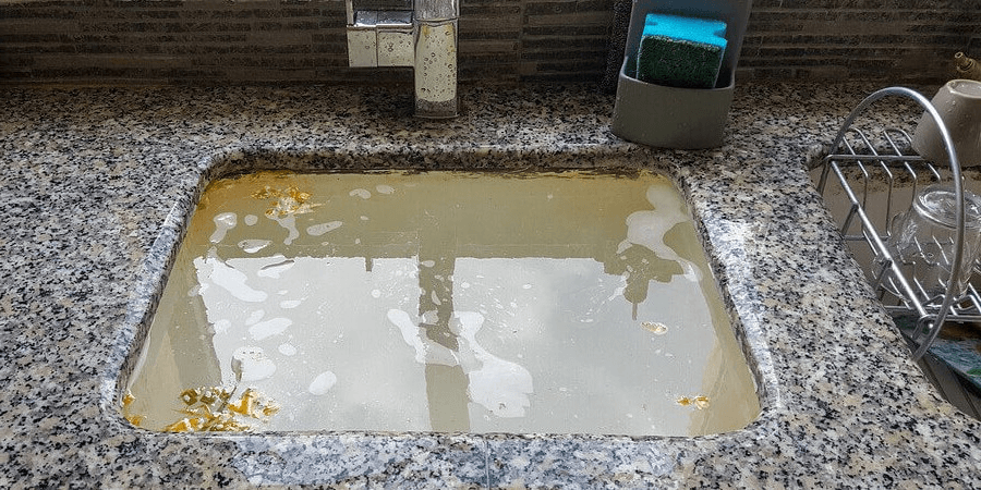 thông tắc chậu rửa bát